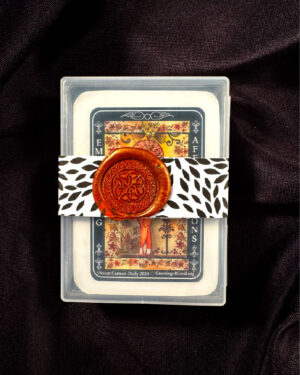 an oracle deck with a brown and orange background, sealed with a wax seal